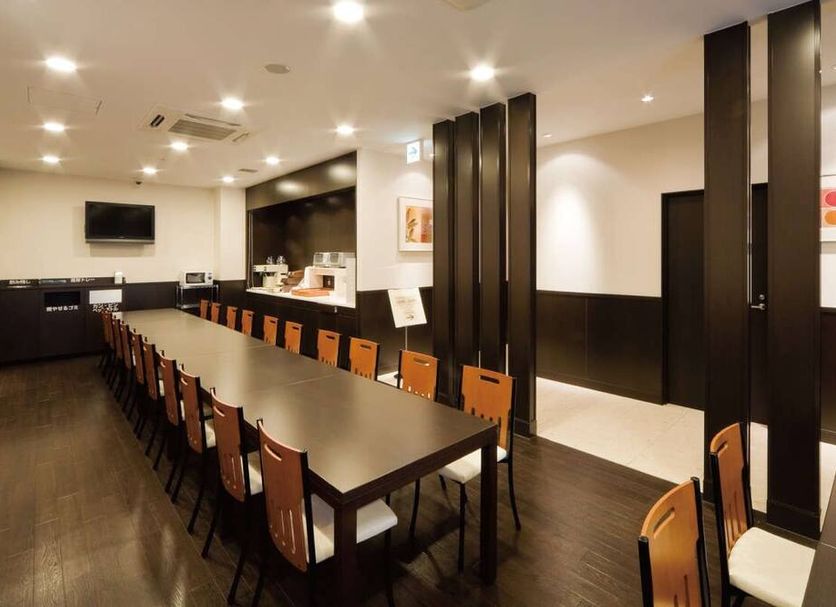 AB Hotel Toyota Motomachi meeting room with long conference table and chairs in Toyota