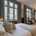 Ashdown Park Hotel & Country Club in East Grinstead bedroom with large bay windows and seating area