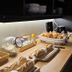 Hôtel L'Europe Cholet breakfast buffet with bread, pastries, cereal dispensers and coffee station