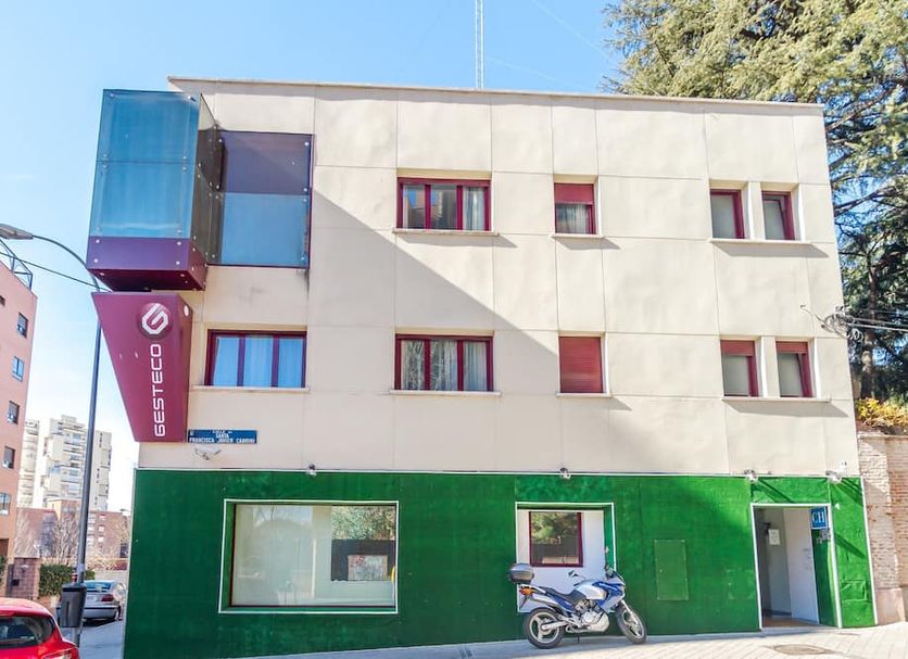 AYZ Javier Cabrini in Madrid, auto check-in hotel exterior with green ground floor and blue balcony
