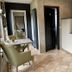 Country-Suites By Verdino Living - Apartments & Privatzimmer in Braunlage, kitchenette with dining table and chairs
