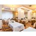 Abashiri Royal Hotel in Abashiri dining room with set tables and chairs