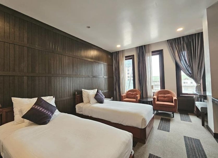 Family Boutique Hotel in Vientiane twin guest room with two beds and large windows