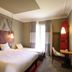 ibis Paris Tour Montparnasse 15ème guest room with two beds, window and desk in Paris