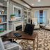 Residence Inn by Marriott West Orange lounge with desks, armchairs and a fireplace in a carpeted room