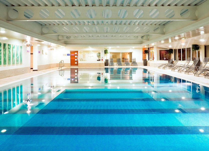 Mercure Manchester Norton Grange Hotel & Spa indoor pool in Rochdale with lounge chairs