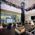 Amwaj Rotana, Jumeirah Beach Dubai lobby with lounge seating and sparkling ceiling lights