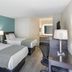 SureStay Plus by Best Western Asheboro guest room with two beds and desk