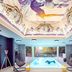 Mercure Château de Fontainebleau Demeures de Campagne indoor pool with muraled ceiling and hanging chairs, Fontainebleau