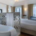 Santiago de Alfama - Boutique Hotel room in Lisbon with freestanding tub and city-view windows