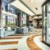 Galeon Residence & Spa lobby in Sunny Beach with modern seating and glass entrance
