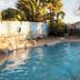 Trail Rider's Inn in Tombstone with outdoor pool and palm trees