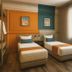Kuala Lumpur International Hotel, Kuala Lumpur guest room with two twin beds and large window
