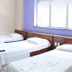 Hotel Dez De Julho in Manaus guest room with three single beds and a window
