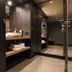 Van Der Valk Hotel Apeldoorn - De Cantharel bathroom vanity with sink, towels and walk-in shower