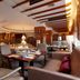 Hotel Kuva Chateau in Taoyuan City restaurant dining area with set tables and warm lighting