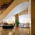 Grand Metropark Hotel Shangqiu lobby with grand staircase, ornate ceiling and central decor