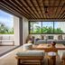 Secrets Tulum Resort And Beach Club lounge with open-air view of palm trees in Tulum
