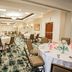 Hilton Garden Inn Winchester banquet room with round tables and banquet chairs in Winchester