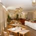 Hotel Rainha D. Amélia dining room with set tables and buffet spread in Castelo Branco