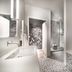 Steigenberger Hotel Treudelberg Hamburg bathroom with mosaic-tiled tub, walk-in shower and vessel sink