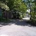 The Garden Walk Bed & Breakfast in Lookout Mountain, tree-lined drive beside cottages