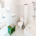 Downtown Forest Hostel & Camping Vilnius bathroom with toilet, sink, shower, and bathtub