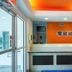 Motel 6-San Antonio, Tx - Sea World North lobby front desk with orange accent wall in San Antonio