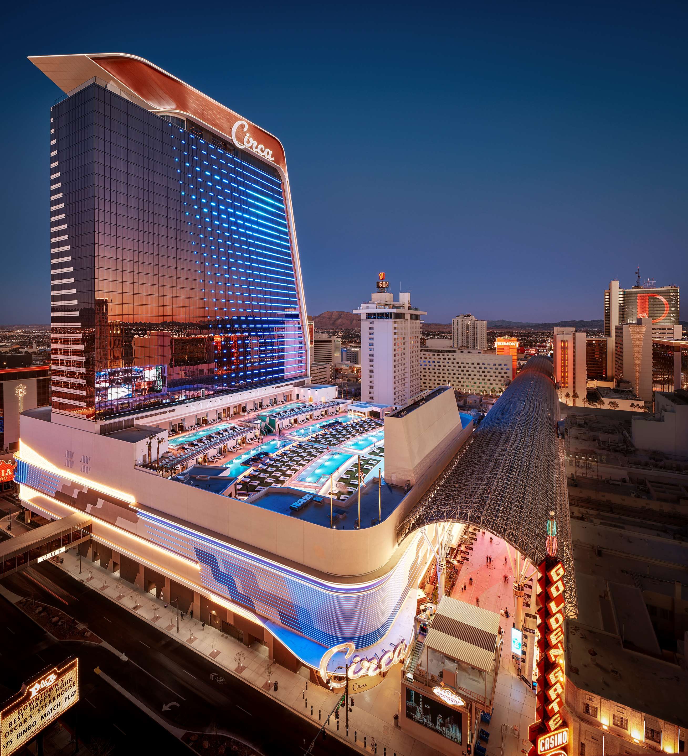 Circa Resort & Casino - Adults Only in Las Vegas with rooftop pool and city skyline at dusk