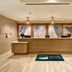 Homewood Suites by Hilton Salt Lake City Airport lobby front desk with wood accents