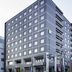 ibis Styles Kyoto Station in Kyoto, modern gray hotel building exterior on a city street