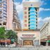 Zhangzhou Yinjia Hotel (Gucheng Branch) in Zhangzhou, street-facing hotel entrance with tall glass tower
