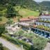 Hotel Ristorante La Rosina in Marostica with hillside setting and flower-lined terrace