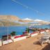 Baldan Suites Hotel & Restaurant in Bozburun with seaside deck, loungers, umbrellas and bay views