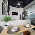 Balboa Park Hotel San Diego room with dining table and scenic mural wall