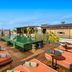 BLESS Hotel Madrid rooftop terrace with loungers, seating areas and city views in Madrid