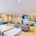 TownePlace Suites by Marriott Coeur d'Alene lobby with seating area and TV, Coeur d'Alene