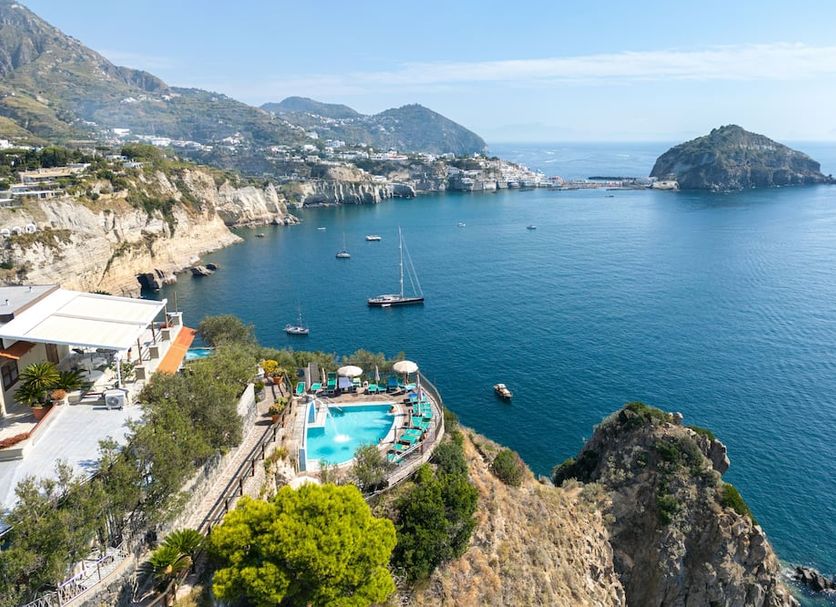 Punta Chiarito Resort in Forio overlooking a cliffside pool and sweeping sea view