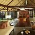 Kayumanis Jimbaran Private Estate & Spa in South Kuta, open-air villa lounge with wooden ceiling and seating