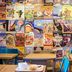 hotelF1 Aix en Provence Sainte Victoire in Meyreuil, colorful travel-poster wall behind tables and blue chairs