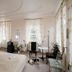 Hotel Goldener Hecht in Heidelberg guest room with large windows, sheer curtains, and a wardrobe