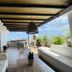 Ocean Breeze Santo Domingo open-air terrace with seating and ocean view