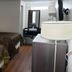 Super 8 by Wyndham Asheville/Biltmore room with two queen beds, TV, desk and lamp in Asheville
