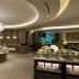 Monarch Plaza Hotel Taoyuan City buffet dining room with chandelier and food display