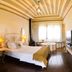 Pousada Paço do Lavradio in São João del Rei with a bright bedroom, twin beds, TV and sitting area