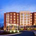 Four Points by Sheraton Raleigh Durham Airport in Morrisville exterior at dusk with illuminated windows