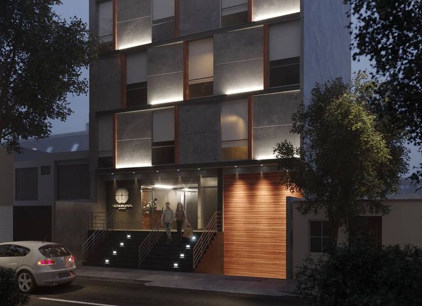 Tierra Viva Miraflores Mendiburu hotel entrance in Lima with lit steps and modern facade