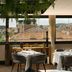 Five Seas by Inwood Hotels in Cannes restaurant with rooftop city views and large windows