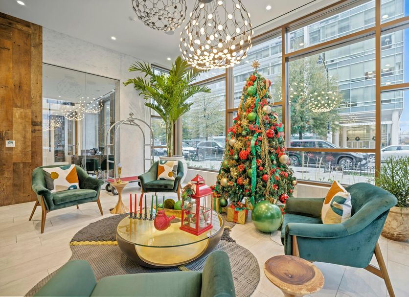 Coda on Half, a Placemakr Experience - Navy Yard lobby with Christmas tree and lounge seating in Washington, D.C.