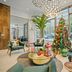 Coda on Half, a Placemakr Experience - Navy Yard lobby with Christmas tree and lounge seating in Washington, D.C.